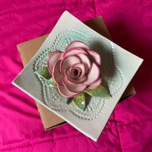 Handmade Essences burner Rose attached to a green plate